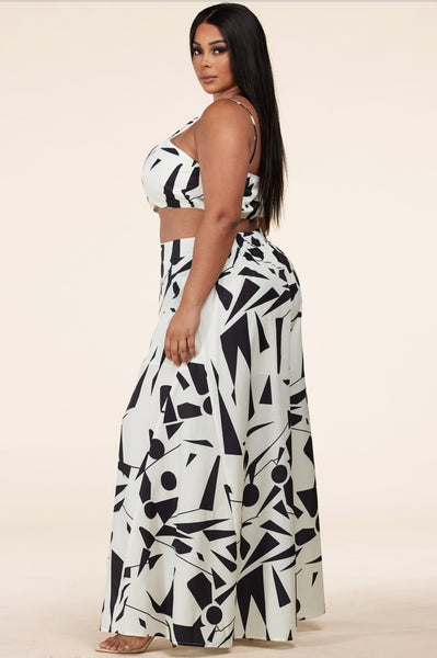 "Drift Away" to an island, an exotic getaway or boat party in this elegant 2 piece set. The palazzo pants give the perfect flow while the top provides an amazing drift. Paired with a sandal, stiletto or wedge, you definitely can't go wrong.     Model is Wearing: Large