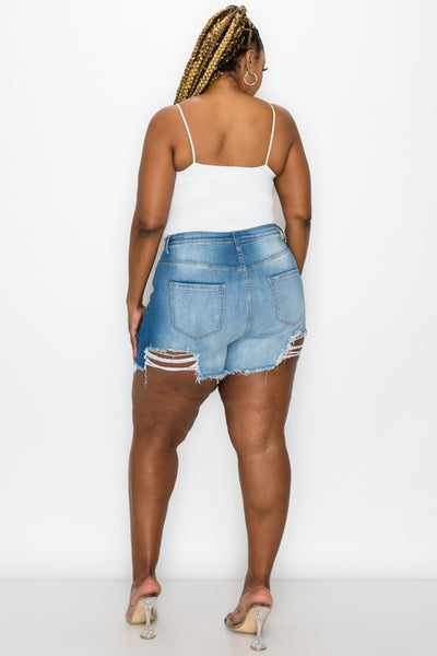 Let the sun bless your skin with the "I'm A Little Torn" Distressed Jean Shorts. These shorts have the perfect stretch and the perfect peek-a-boo leg that's sure to turn heads. Pair it with a cute tee, bodysuit or swimsuit and you'll be set to soak up the sun!   Model is Wearing: Large